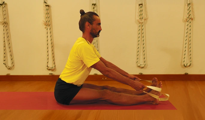 Seated Forward Bend Pose (Paschimottanasana) Using a Yoga Belt